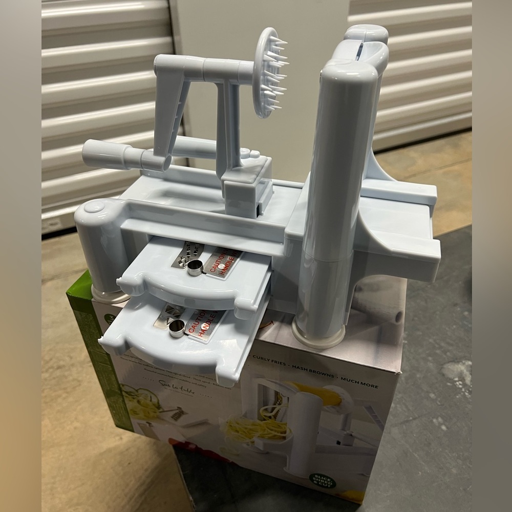 White spiral slicer for vegetables and fruits.